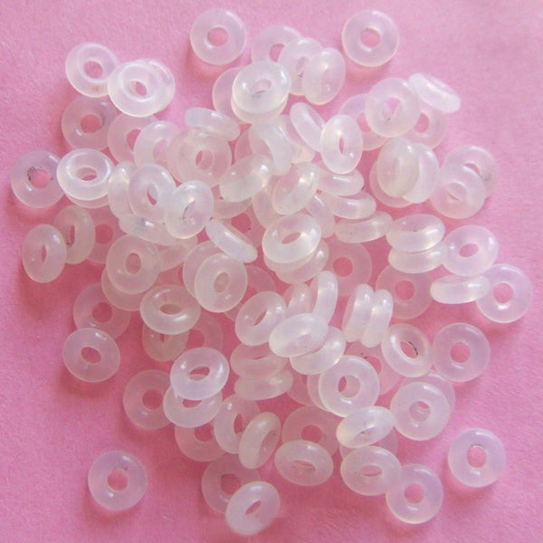 Clear silicone rubber stopper clip inserts holds charm in place