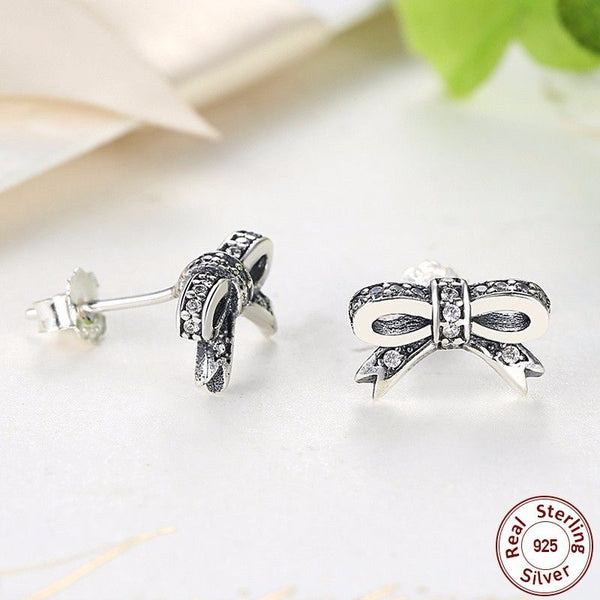 PAIR OF SPARKLING DELICATE BOW STUDS