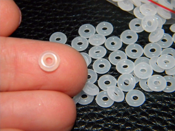 Clear silicone rubber stopper clip inserts holds charm in place