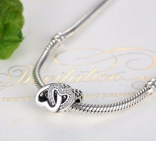 Entwined love twin heart Charm