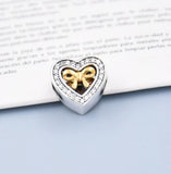 In Love Connected Heart Gold Bow Stone Charm