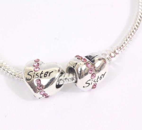 Silver Plated sister love Heart Pink/Blue stone Charm