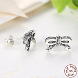 PAIR OF SPARKLING DELICATE BOW STUDS
