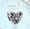 Silver Sterling Heart of winter snowflake ice crystal frosted Charm